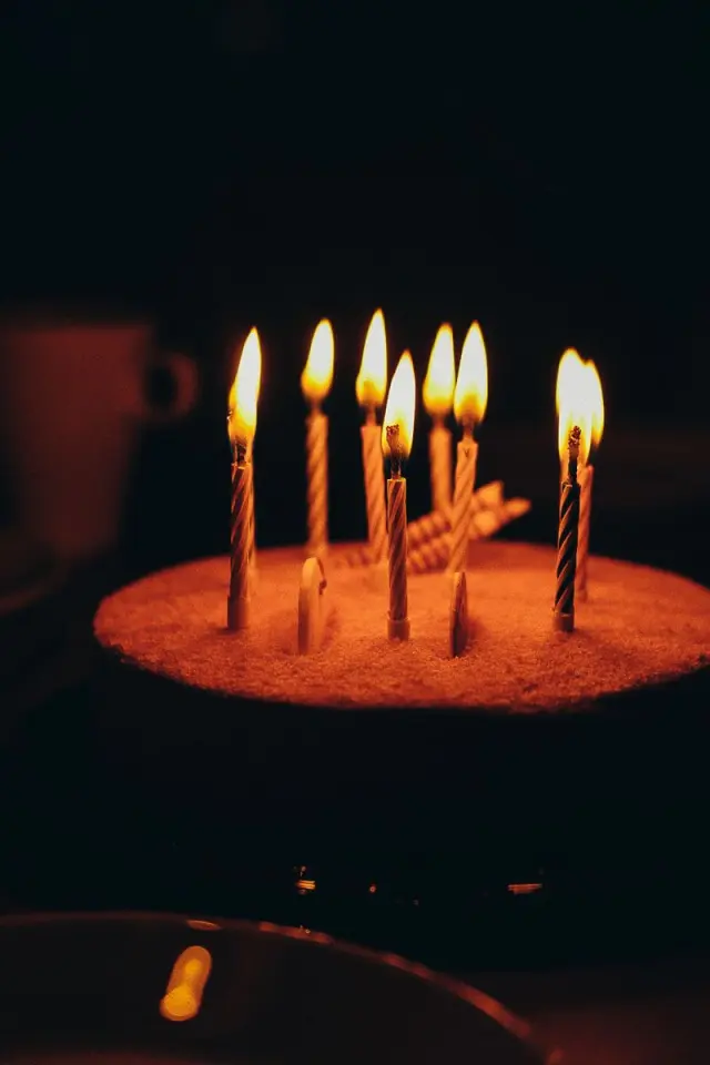 Birthday candles glowing warmly